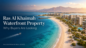 Ras Al Khaimah waterfront property concept showing beachfront residences and turquoise sea.