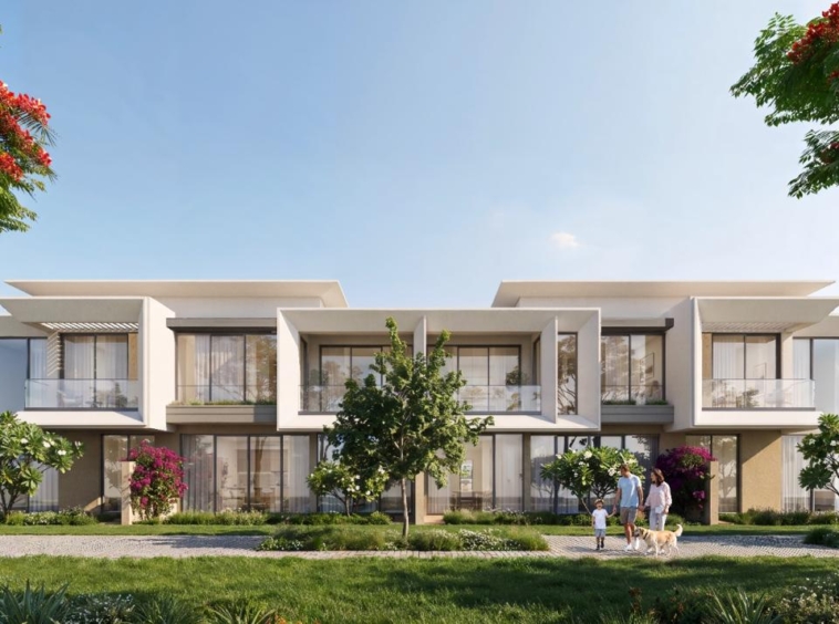Modern townhouses overlooking green spaces at Azizi Florence Sharjah