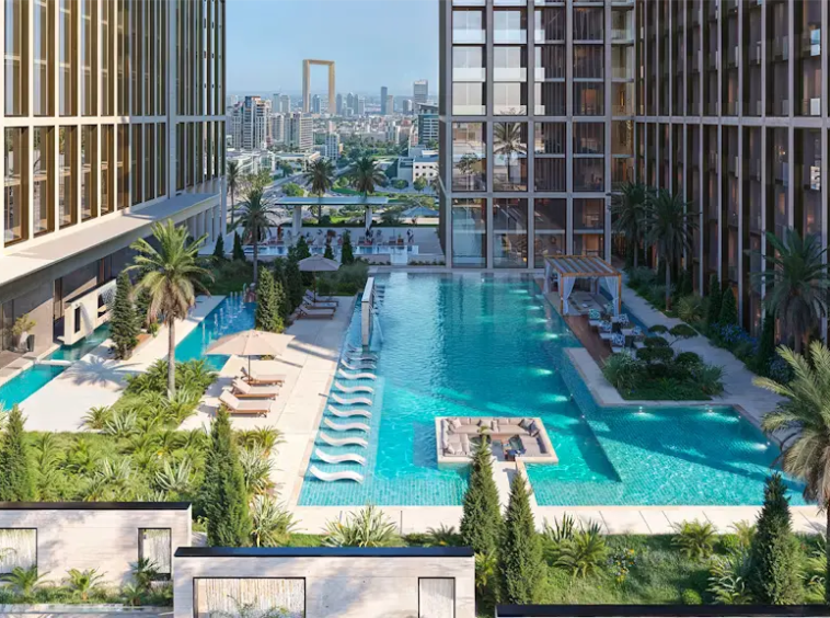 Aerial view of the resort-style swimming pool and landscaped amenities at Binghatti Spectre Dubai