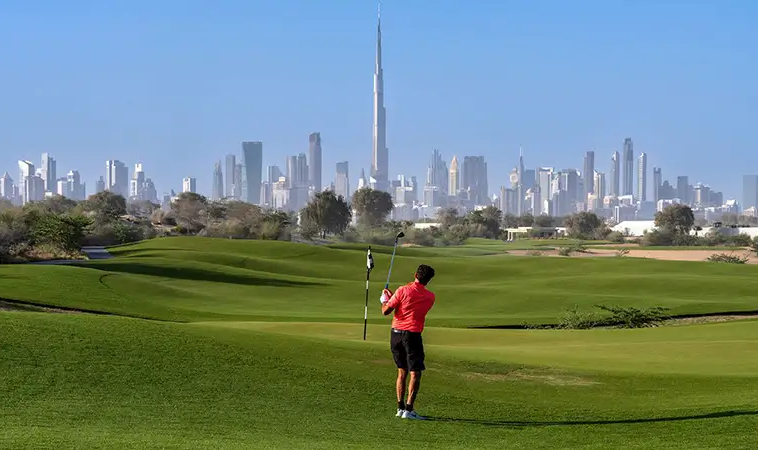 Golf course with Dubai skyline near Wadi Hills DLRC