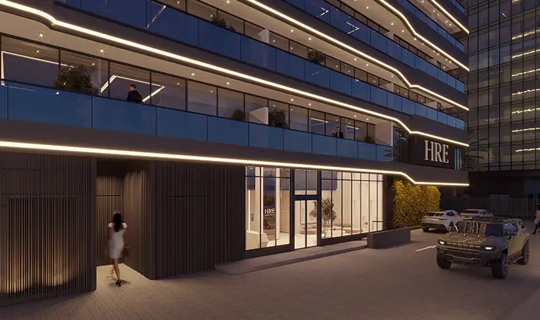 Illuminated exterior entrance at Wadi Hills by HRE Development